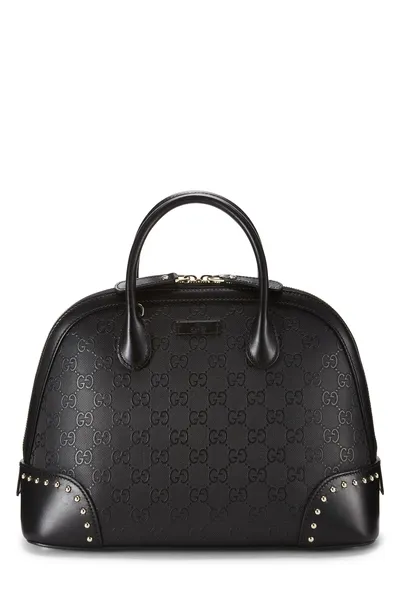Gucci Black Embossed Top Handle Convertible Handbag — photo 1